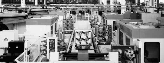 Macchina a più stazioni con pallets