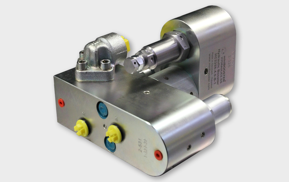 Moltiplicatore miniBOOSTER HC2258 con valvola limitatrice di pressione, direzionale e di controbilanciamento incorporate